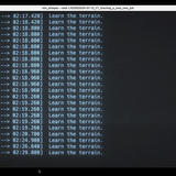 A terminal window displaying a command execution log titled ‘mlx_whisper –task 1/V/V/P/2026-01-13_YT_Starting_a_new_new_job’. The screen shows multiple timestamped entries in cyan text, each with a time range in brackets (like 02:16.220 to 02:17.420) followed by the repeated message ‘Learn the terrain.’ The timestamps progress from 02:16 to 02:29, showing the sequential execution of tasks during what appears to be a machine learning whisper model processing job.