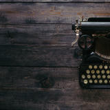 Antique Typewriter on Dark Wood