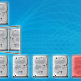 Diagram of hard drives illustrating ZFS vdev configurations, showing a single disk, a mirrored pair, and a RAID-Z group with one drive highlighted red.